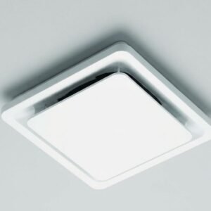 A close-up of a modern white bathroom exhaust fan installed on a ceiling.